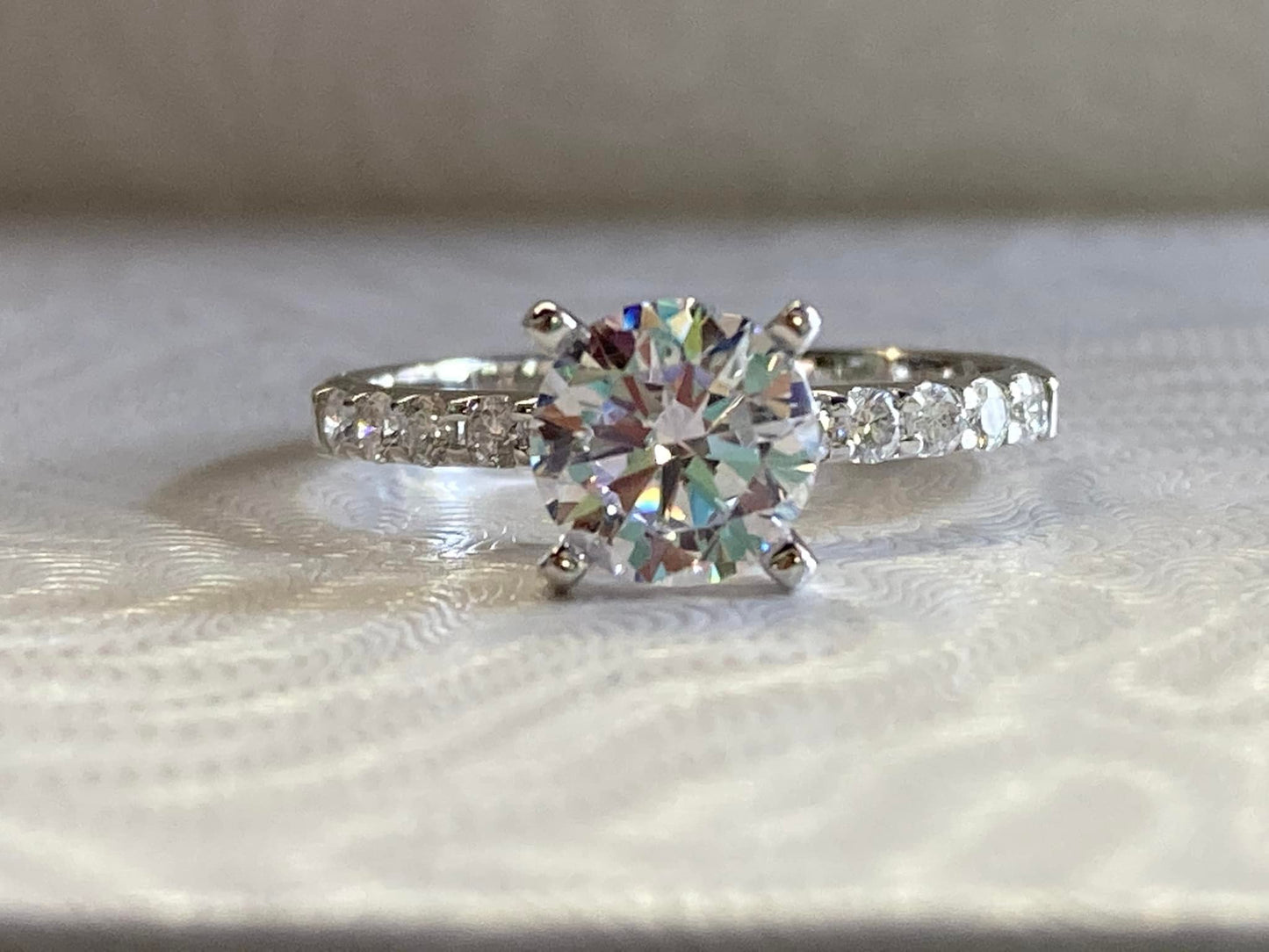 14KW 1/4ct Diamond Ring - 1ct Round main Diamond.