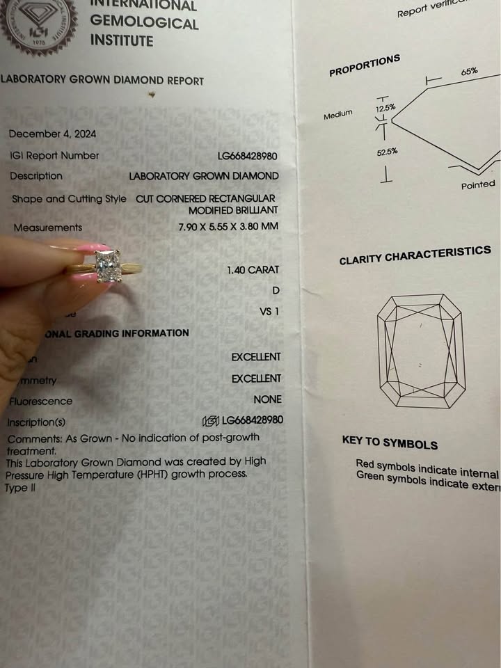 Laboratory grown diamond report with a diamond held above it on a white background