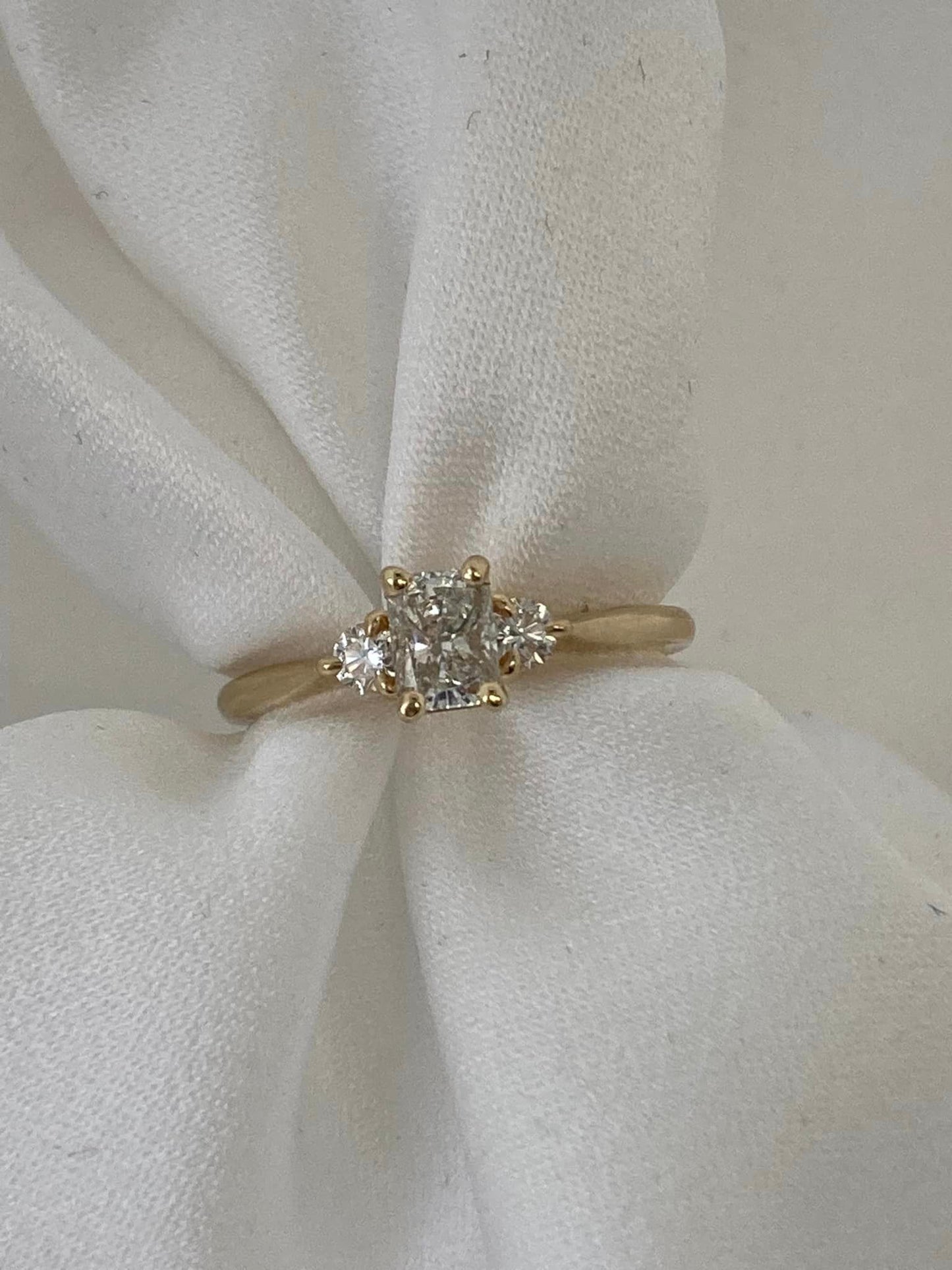 14KY Gold featuring a .53ct Radiant Cut Diamond